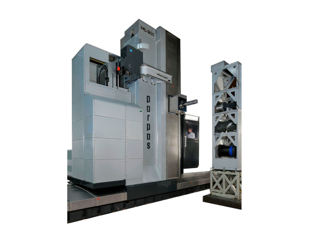 Gruppo Parpas ML 200. A large floor borer featuring a vertical column with a spindle head for precision machining a large horizontal worktable for holding workpieces. It also includes an automatic tool changer system on the right side, enclosed components, and a metal platform with safety railings. With an enclosure for control of the machine. Sold in the U.K by Leader CNC Technologies