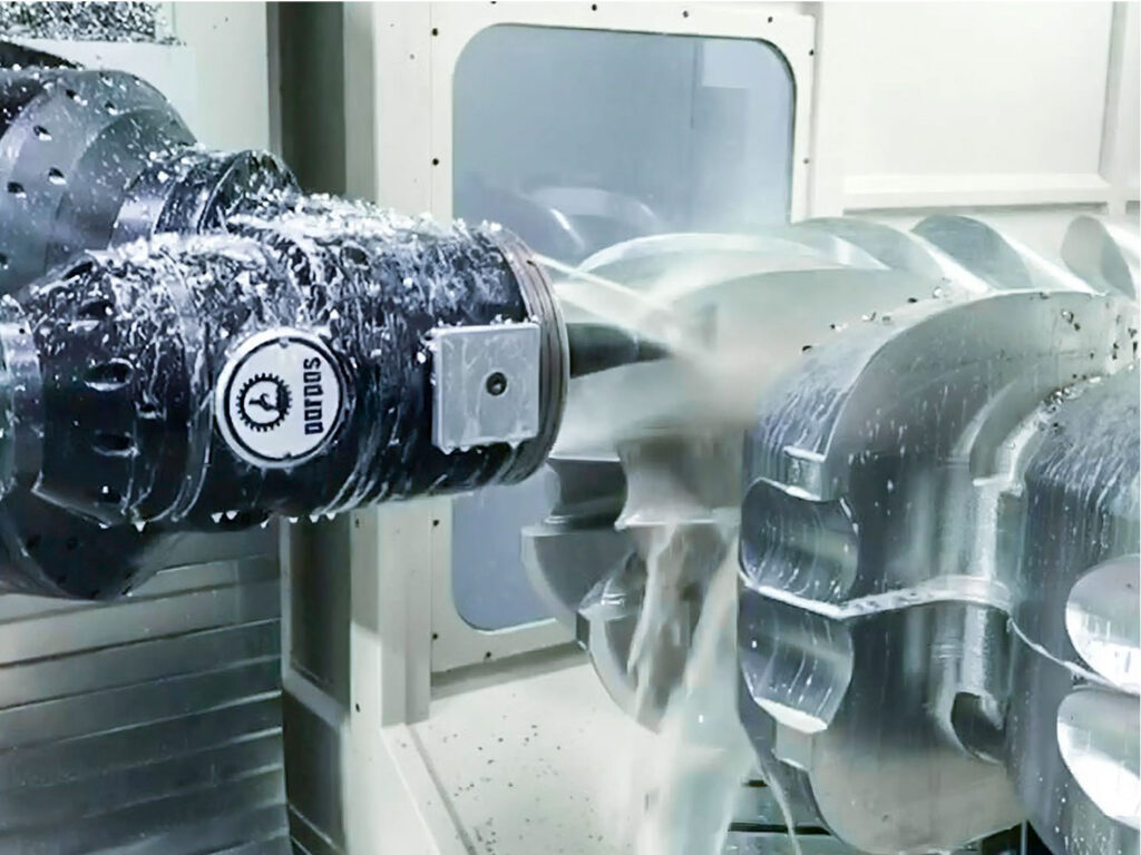 Component being manufactured on the Gruppo Parpas THS120 multi axis CNC machine. Coolant coming through the spindle and part being machined. Sold in the U.K. by Leader CNC Technologies.