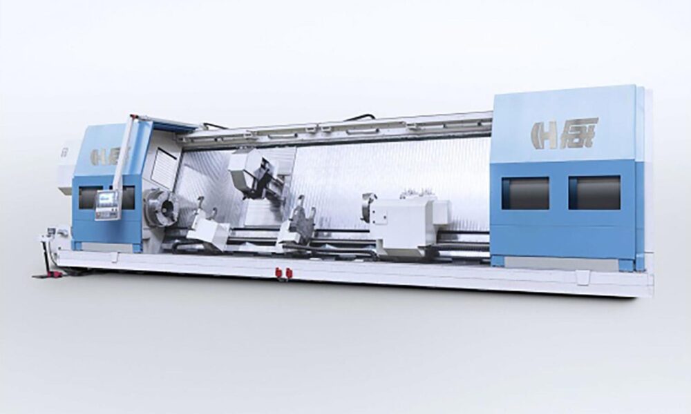 The front view of a large FCTS FAT Haco lathe with doors open, sold by Leader CNC Technologies.