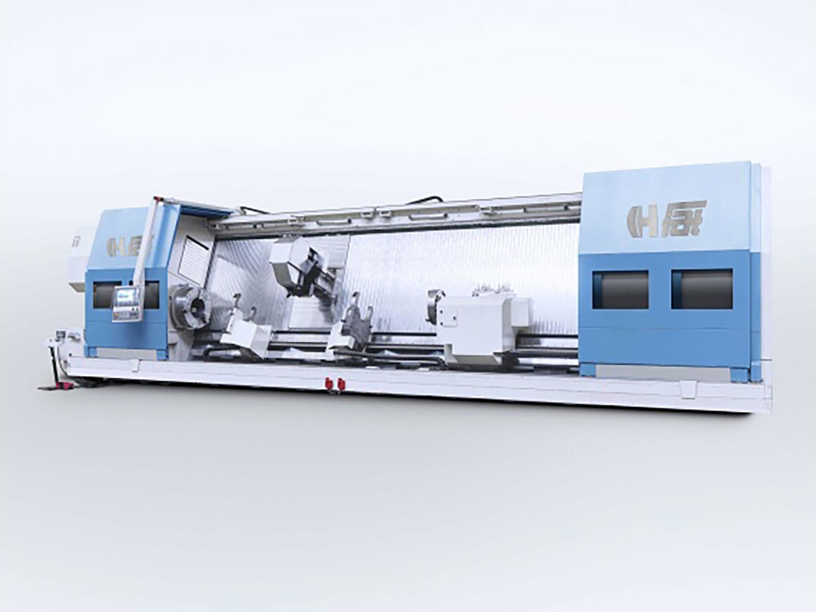 The front view of a large FCTS FAT Haco lathe with doors open, sold by Leader CNC Technologies.