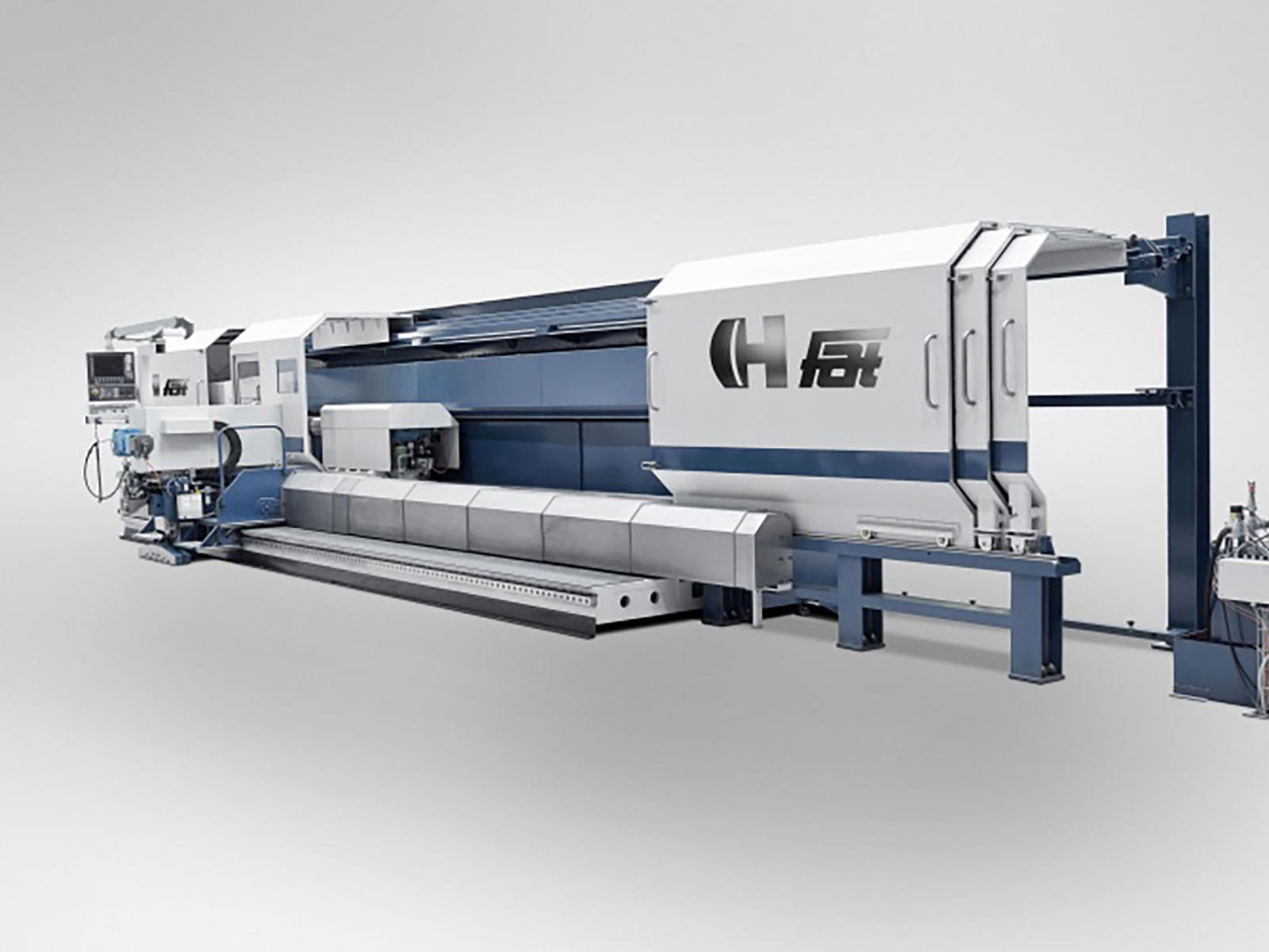 The side view of the TUR4MN FAT Haco lathe, doors open. Sold by Leader CNC Technologies.