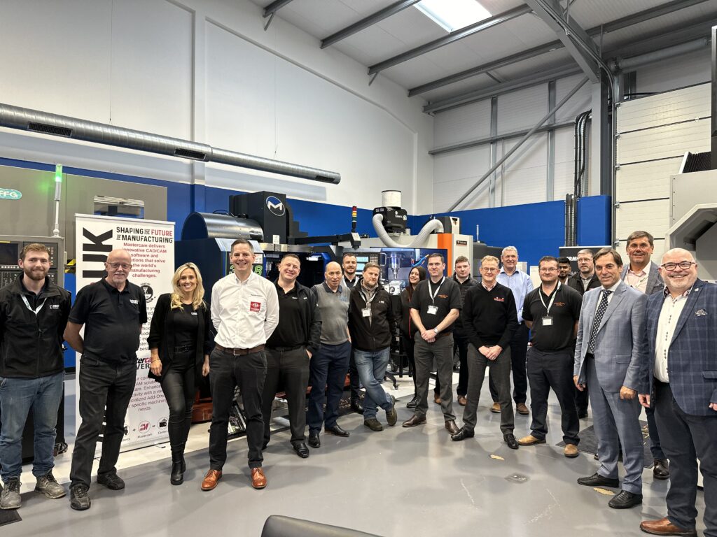 Event at Leader CNC Technologies. Group photo of the event with suppliers, customers and team members
